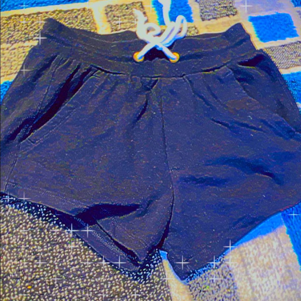 Blue and black leggings and black shorts joggers